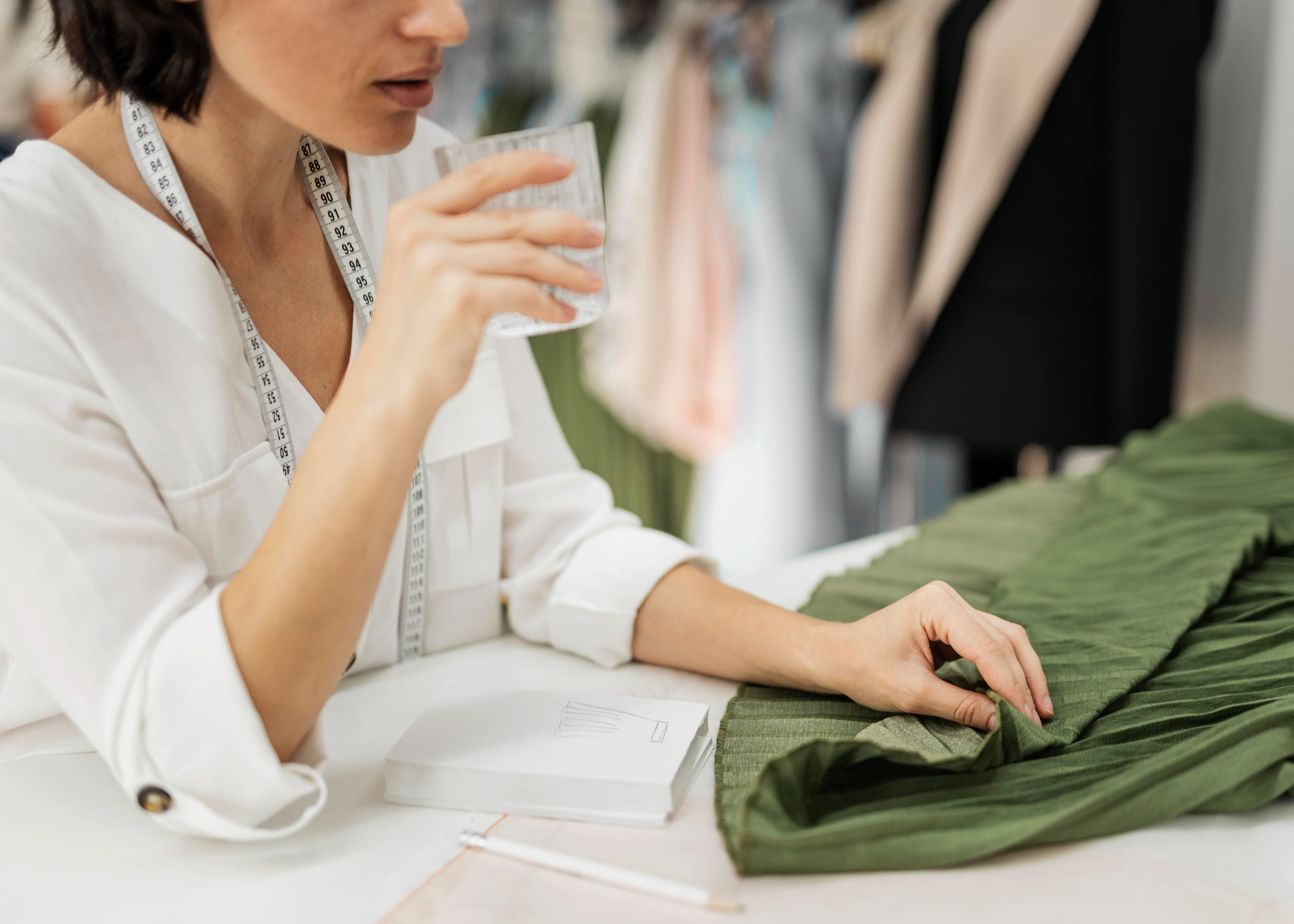 Photo of a women manufacturing a garment - part of the fashion supply chain that is transparent due to the TextileGenesis platform