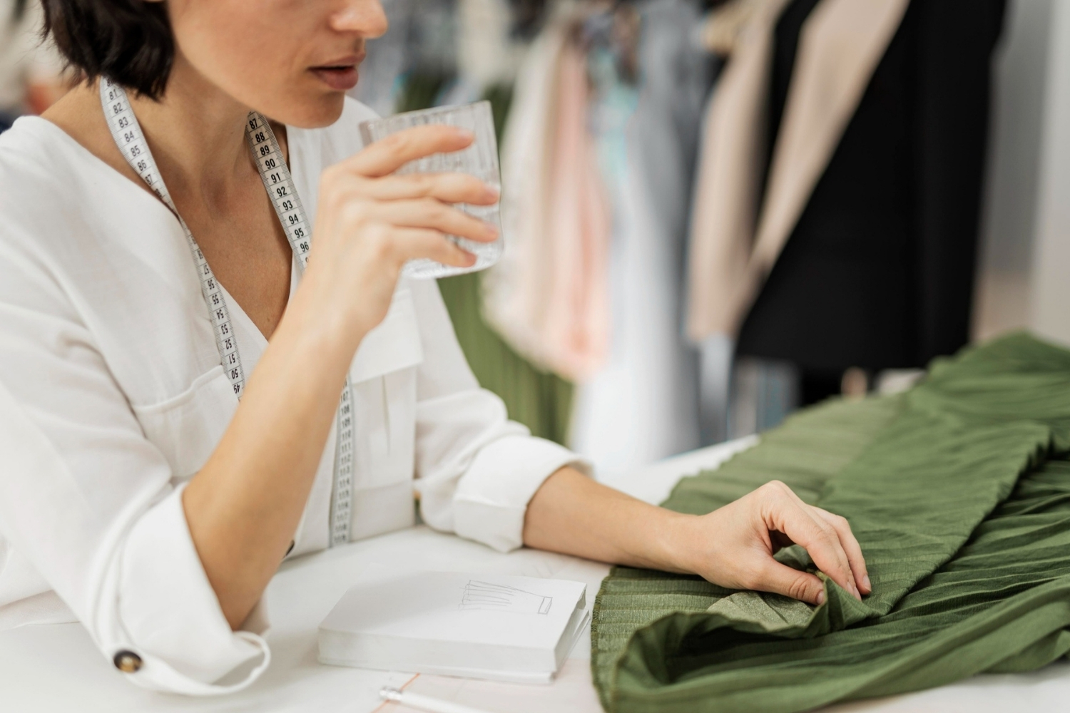 Photo of a women manufacturing a garment - part of the fashion supply chain that is transparent due to the TextileGenesis platform